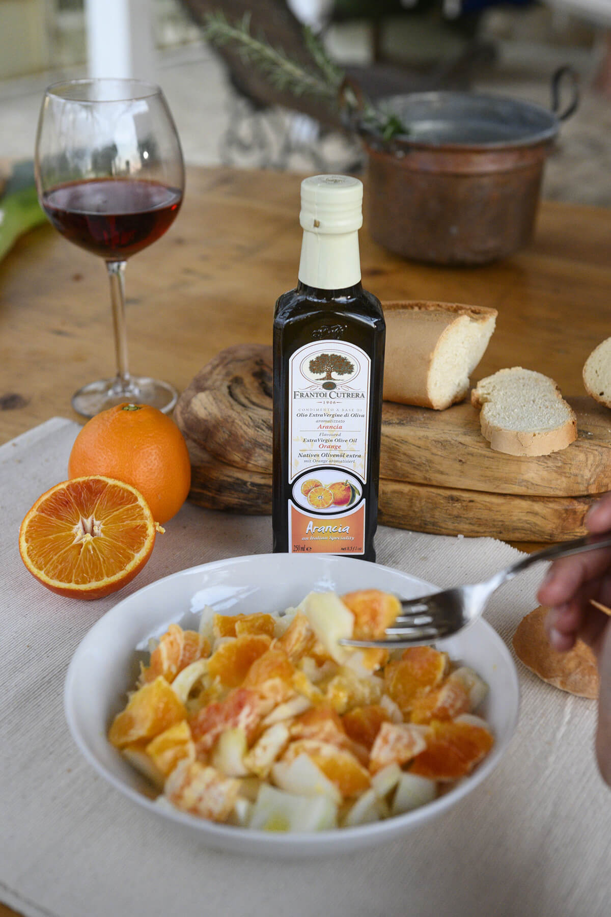 Condimento a base di olio extra vergine di oliva 98% aromatizzato all'arancia
