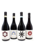 Box Degustazione Akrille: le quattro bottiglie di vino rosso siciliano Cerasuolo di Vittoria DOCG, Cerasuolo di Vittoria Classico Taliari, Nero d'Avola DOC e Vittoria DOC Frappato